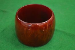 A large cherry amber style bangle.