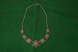 Filigree silver necklace.