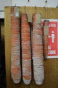 A quantity of small terracotta plant pots.