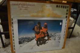 A photographic colour print depicting two mountaineers, signed Chris Bonnington (?) together with