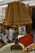 An ornate table lamp.