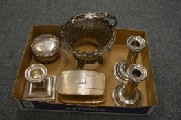 A collection of silverware and plated items