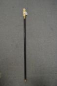A walking stick, the bone handle modelled as mice.