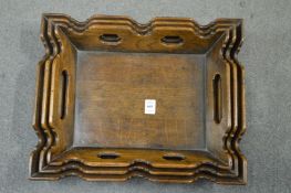 A graduated set of three oak trays.