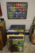 An artist collection of oil paintings on canvas and board, some framed.