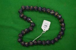 A bead necklace.