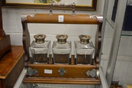 A silver mounted tantalus.