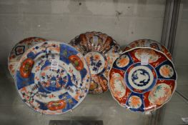 Five Imari plates.