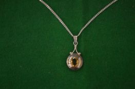Silver pendant and chain.