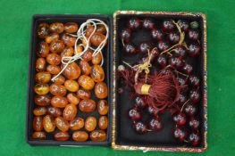 Quantity of amber beads and a cherry amber style bead necklace.