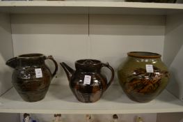 Two studio pottery jugs and a similar teapot.