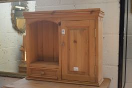 A small pine cupboard.