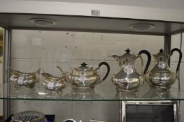 A good silver five piece tea set (76 ounces).