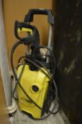 A Karcher pressure washer.