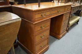A Victorian walnut pedestal desk.