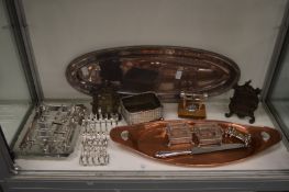 A quantity of plated items to include a stylish nut cracker, toast racks, asparagus dish and tongs