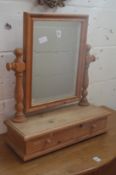 A pine dressing table mirror.