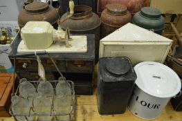 A quantity of bygones to include an old milk bottle, carrier and bottles.