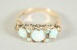 A 9CT. GOLD OPAL VICTORIAN STYLE RING.