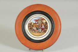 A PORCELAIN POT LID, THE PARISH BEADLE 4ins diameter. Framed