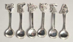 SIX NOVELTY SILVER SPOONS.