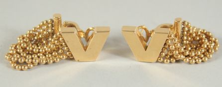 A PAIR OF 18CT. GOLD VERSACE V EARRINGS, 25 GRAMS.