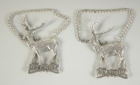 A PAIR OF NOVELTY STAG WINE WHITE METAL SCENT BOTTLES BRANDY AND SHERRY, 6