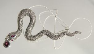 A SILVER MARCASITE AND GARNET SNAKE NECKLACE.