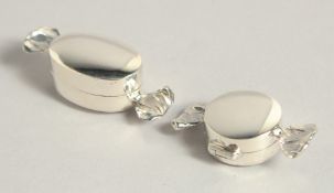 TWO SILVER SWEETIE PILL BOXES.