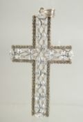 A LARGE CRYSTAL SET CROSS, 8cm long.