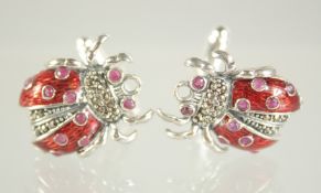 A PAIR OF SILVER LADYBUG CUFFLINKS.