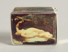 A SILVER AND ENAMEL NUDE PILL BOX, 1.25