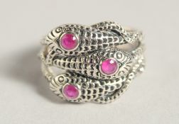 A SILVER RUBY SET THREE RING.
