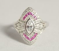 A SILVER DECO STYLE RING WITH CUBIC ZIRCONIA AND RUBY.