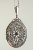 A SILVER SUFFRAGETTE COLOUR LOCKET AND CHAIN.