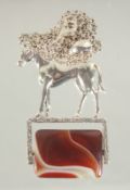 A NOVELTY SILVER AND AGATE HORSE FOB AND CHAIN.