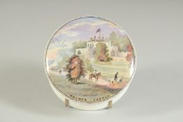 A POMADE POT AND LID, WALMER CASTLE WITH THE DUKE OF WELLINGTON, 3.75ins diameter.