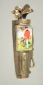 A NOVELTY BRASS AND ENAMEL GOLF BAG VESTA 7.cm long.
