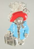 A SILVER AND ENAMEL PADDINGTON PENDANT AND CHAIN.
