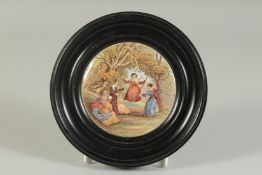 A PORCELAIN POT LID, THE SWING (VERY RARE) 4ins diameter. Framed