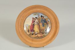 A PORCELAIN POT LID, THE IRISHMAN, (rare), 4ins diameter, framed.