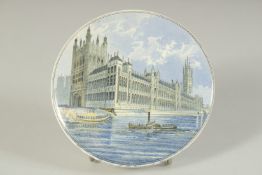 A PORCELAIN POT LID, THE NEW HOUSES OF PARLIAMENT 4.75ins diameter
