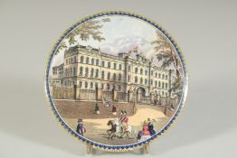 A PORCELAIN POT LID, BUCKINGHAM PALACE 5ins diameter