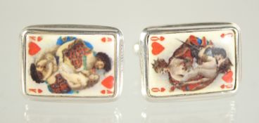 A PAIR OF SILVER AND ENAMEL PLAYING CARD CUFFLINKS.