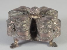 A 19TH CENTURY INDIAN SILVER SPICE BOX, with four compartments, 10cm wide.