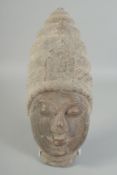 A CARVED STONE BUDDHA HEAD, 37cm x 15cm.