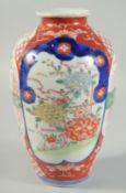 A JAPANESE IMARI PORCELAIN VASE, 24cm high.
