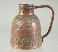 A SMALL EMBOSSED AND CHASED COPPER JUG, decorated with animals, 9.5cm high.