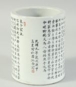 A CHINESE REPUBLIC PERIOD PORCELAIN BRUSH POT, with characters and red four-character mark to