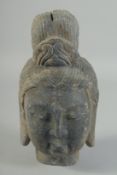 A CARVED STONE BUDDHA HEAD, 22cm x 12cm.